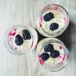 blackberry high protein overnight oats in mason jars