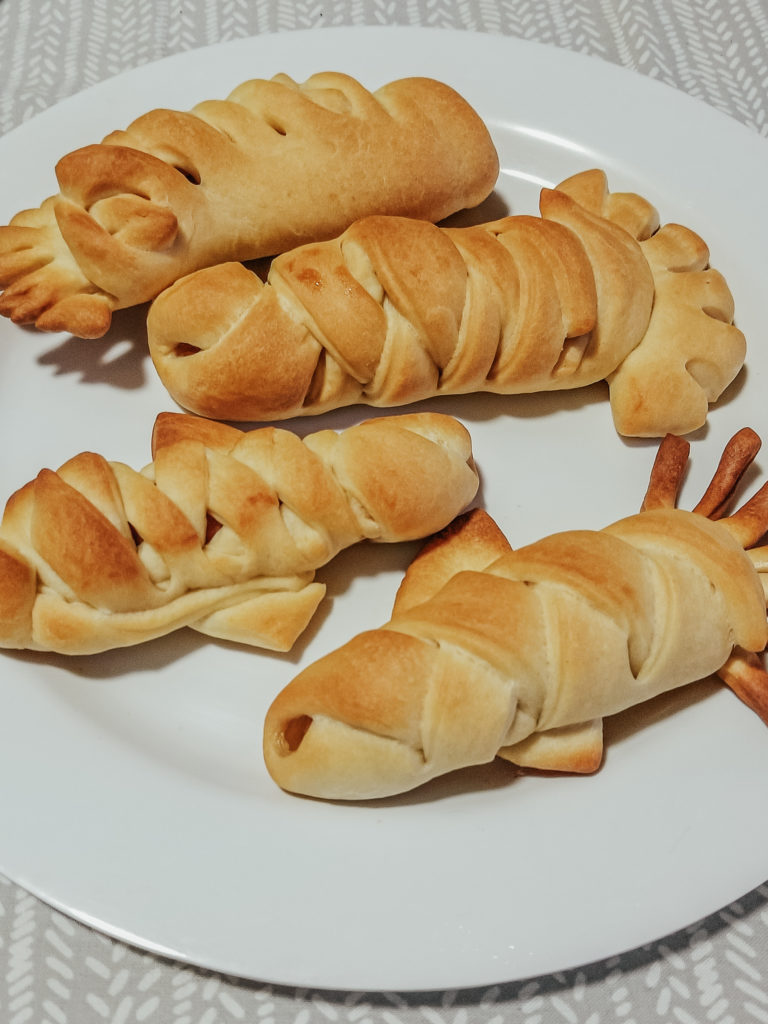 sausages in goldfish crescent roll dough