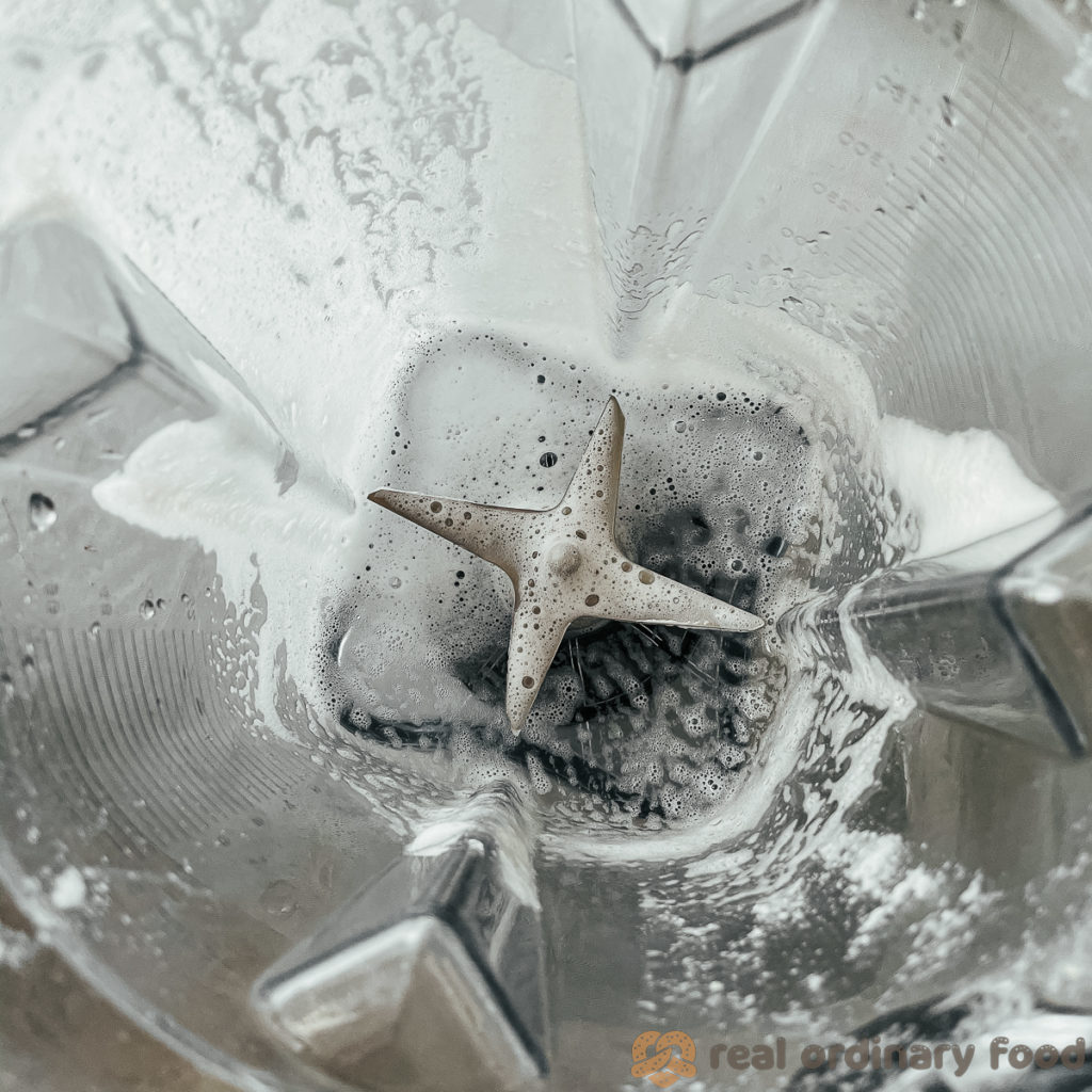 rinsing out soy foam from the blender.