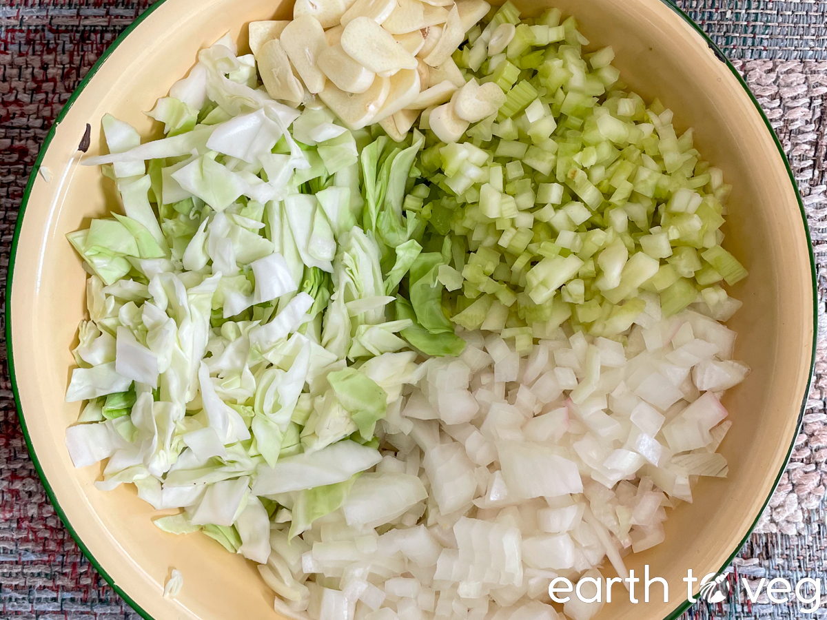 chopped garlic, celery, cabbage, and onion