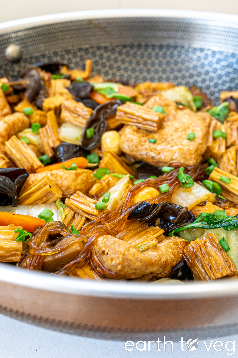 close up of a shot of vegetarian buddha's delight still in the wok