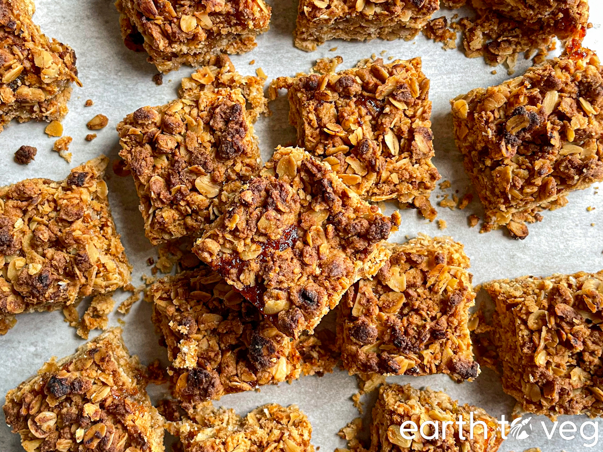 Hjónabandssæla cake squares arranged haphazardly over a grey countertop.