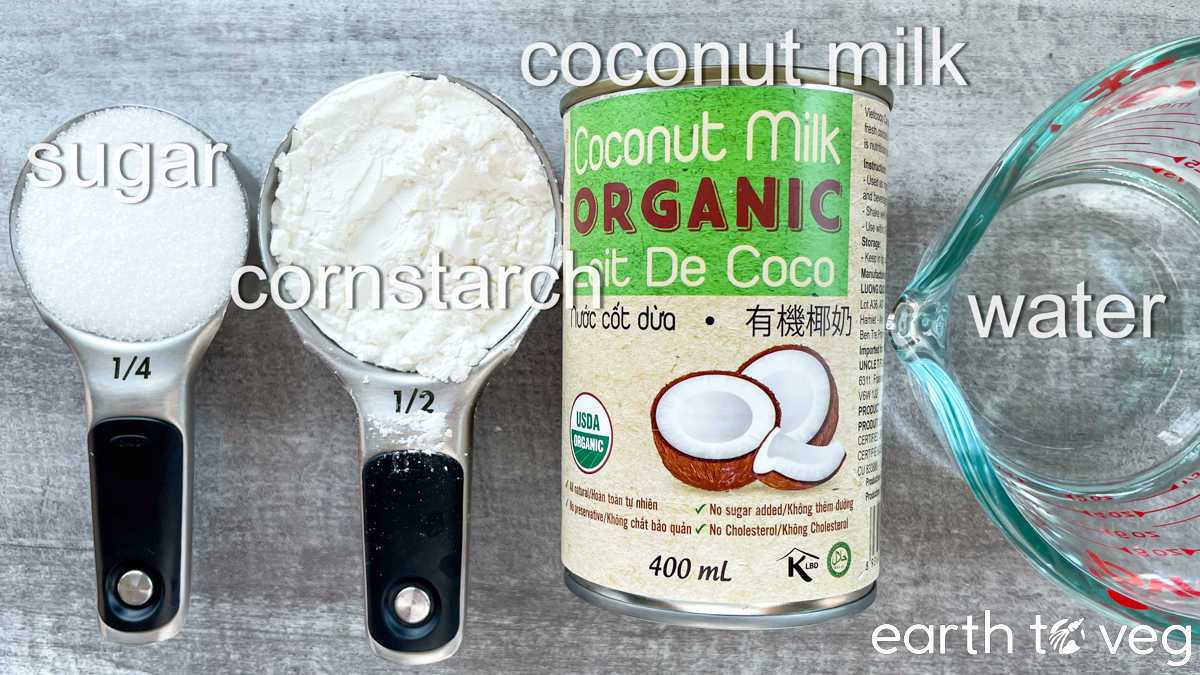 Sugar, cornstarch, coconut milk, and water are spread out on a grey countertop.